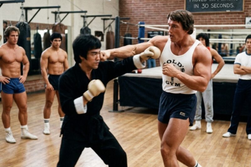 The Architecture of Power: Why Arnold Schwarzenegger Had to Bow to the Speed of Bruce Lee